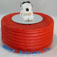 Snoopy Figurine on Buttercream Cake